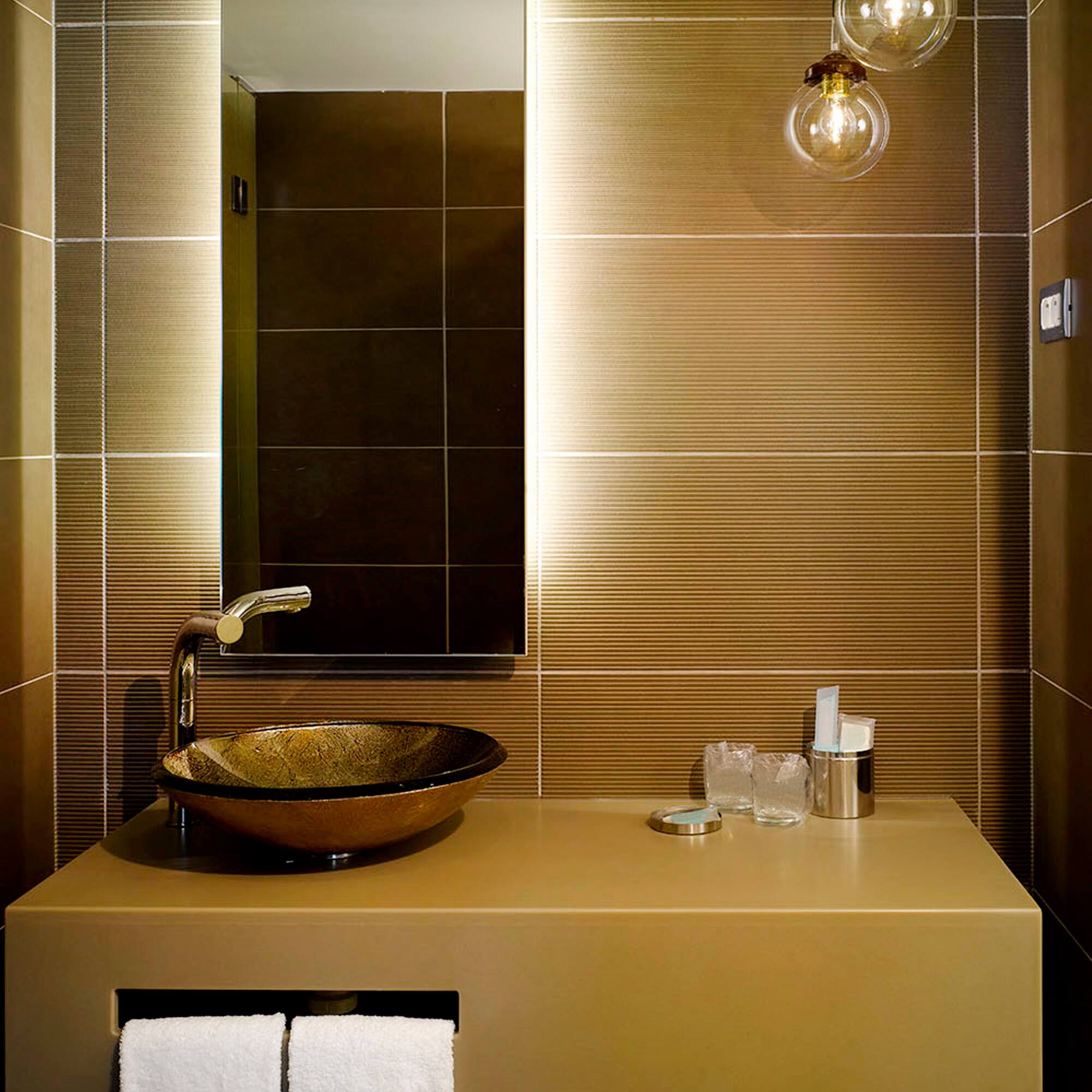 a bathroom with a sink and mirror