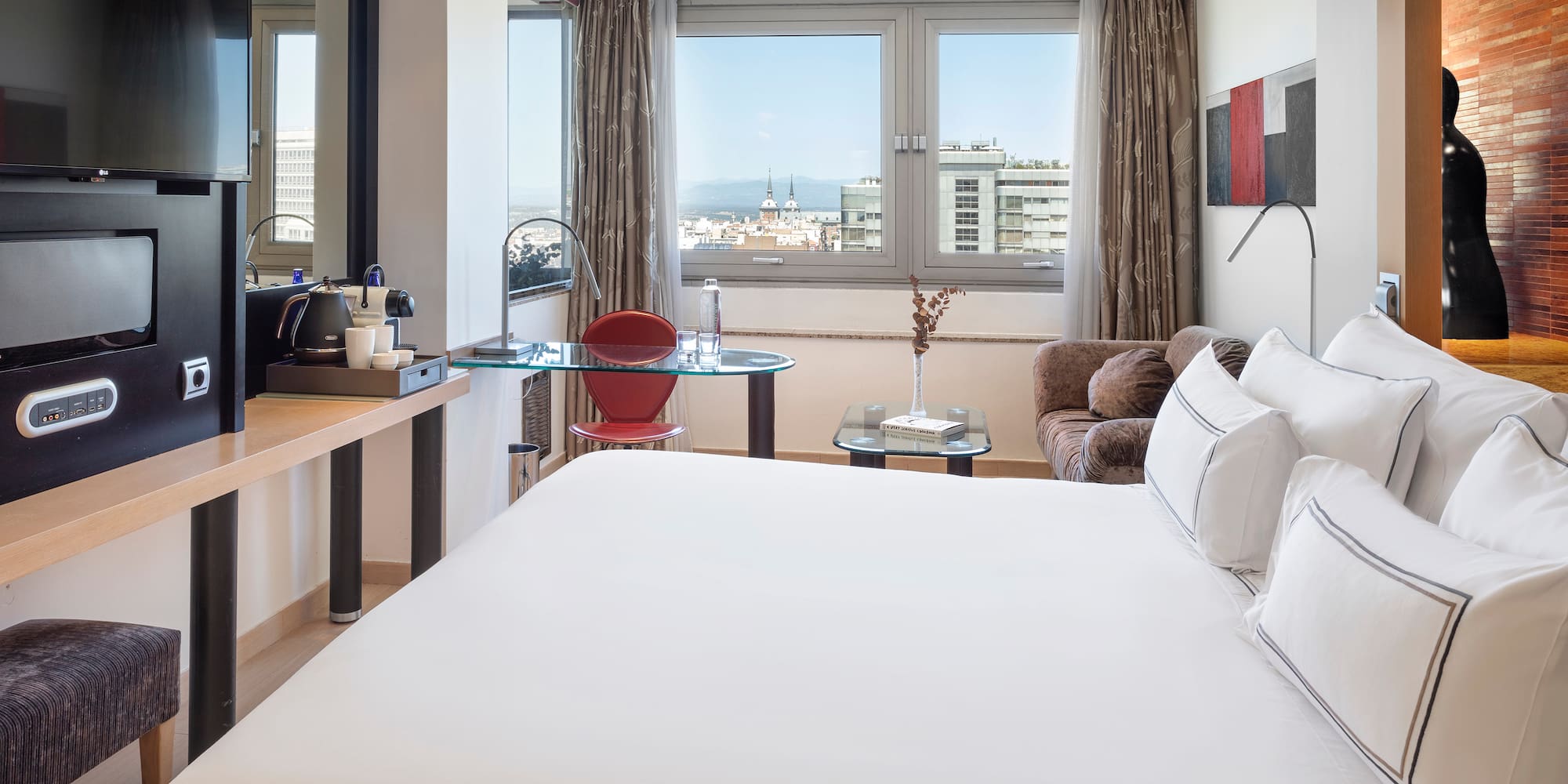 a room with a bed and a desk