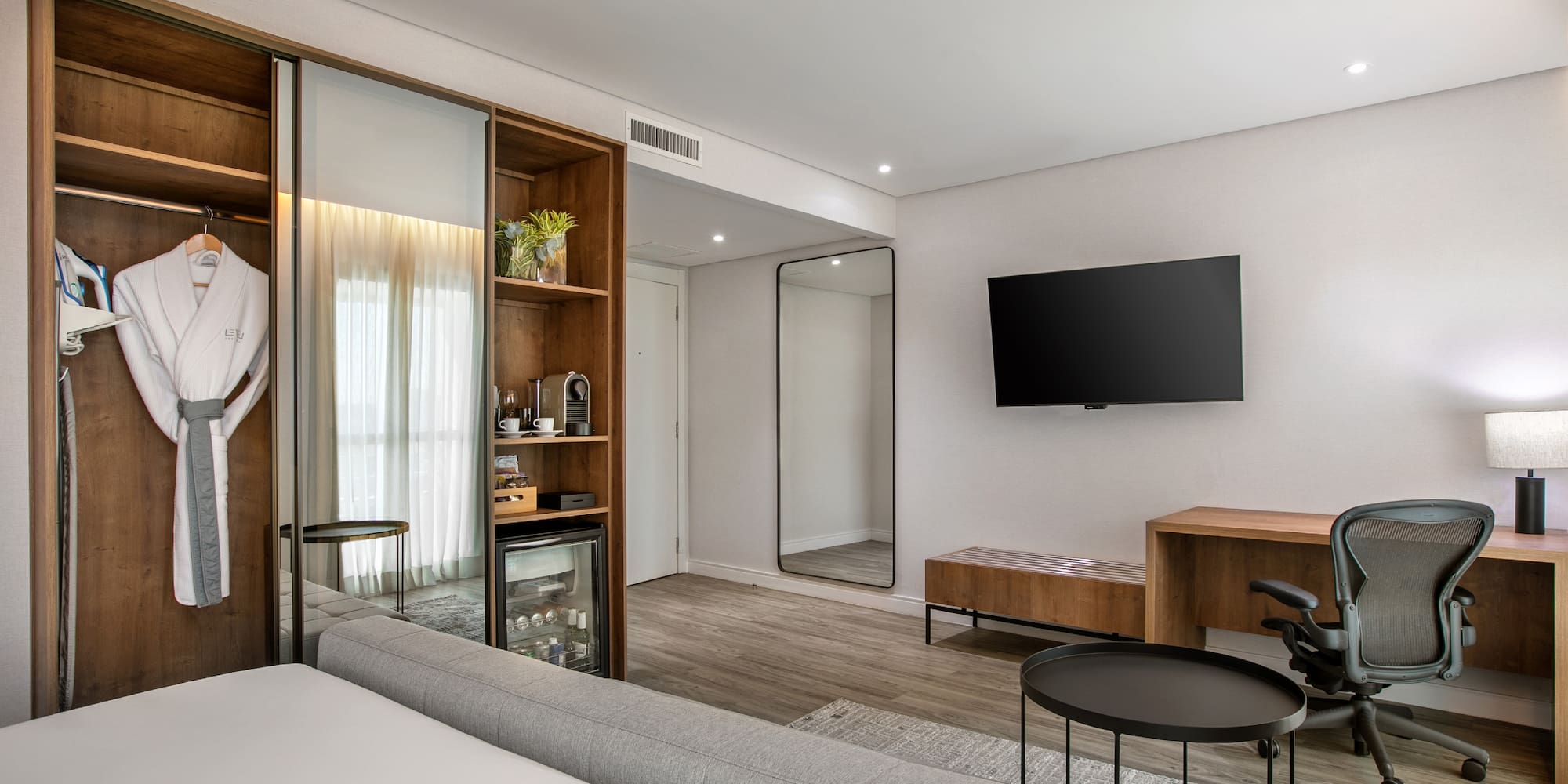 a room with a tv and a couch