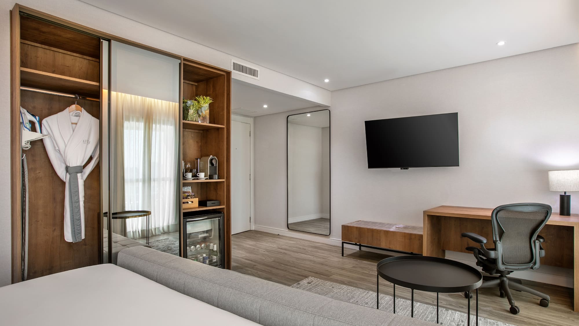 a room with a tv and a couch