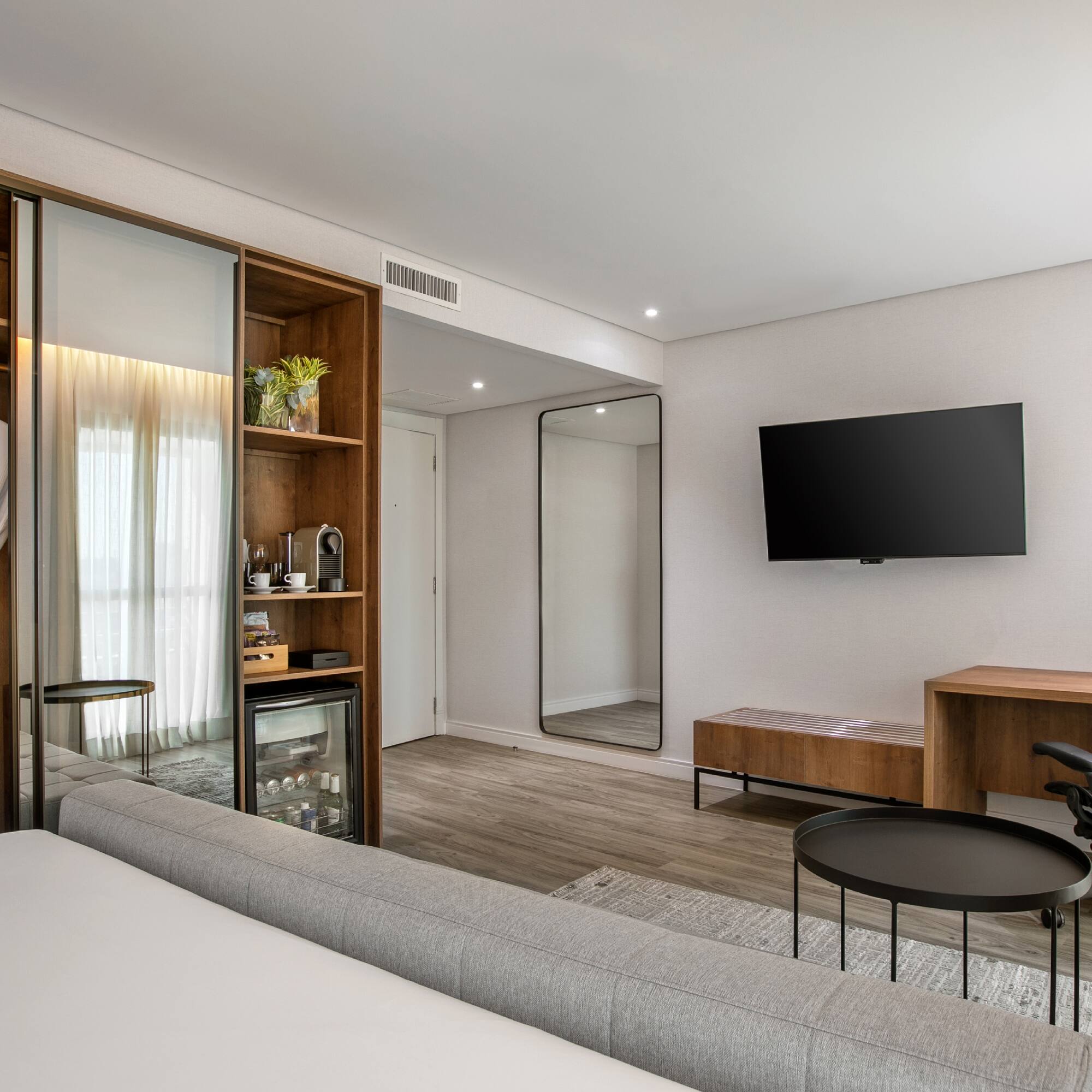 a room with a tv and a couch