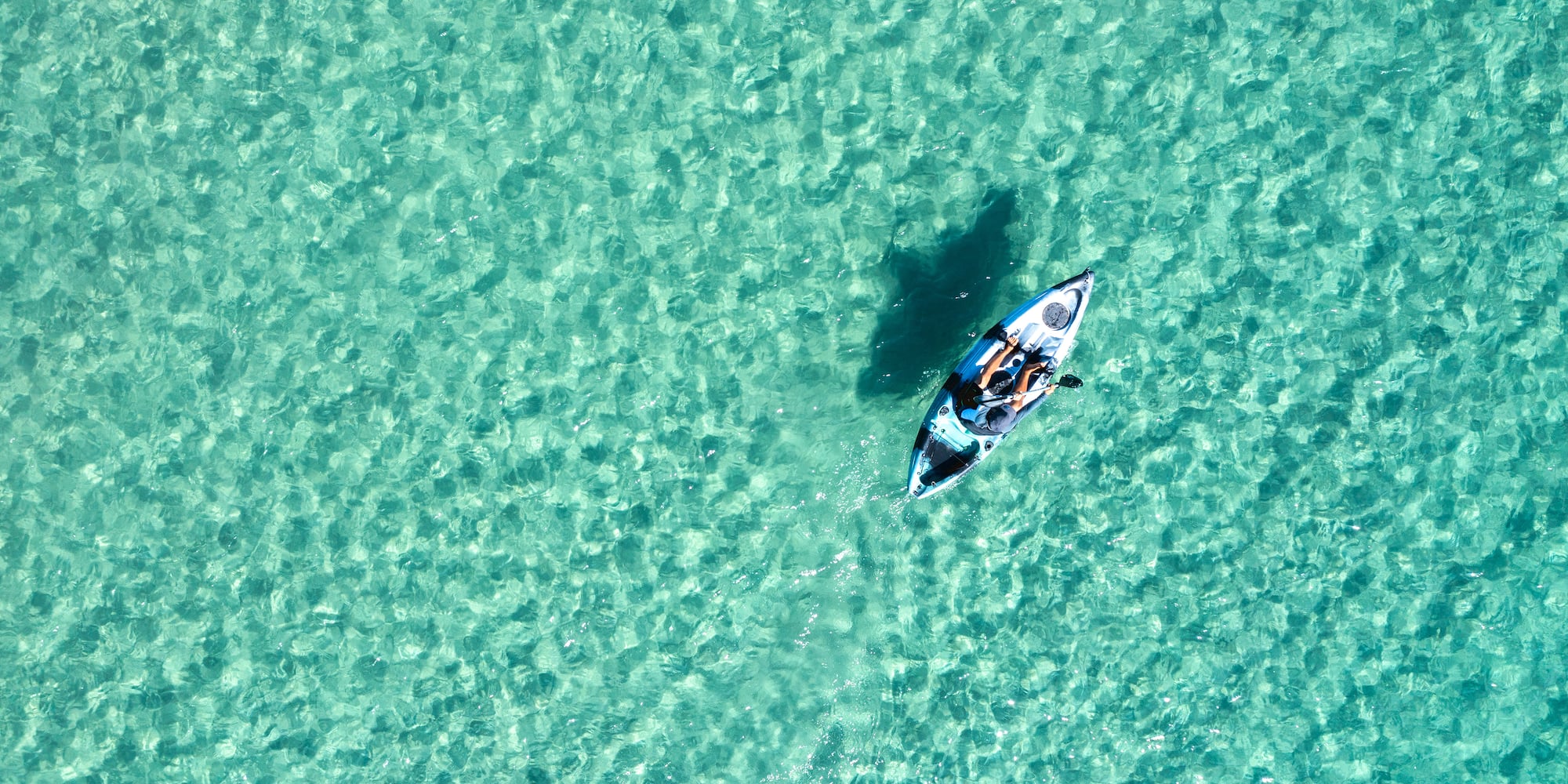 a person in a kayak in the water