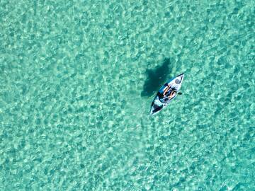 a person in a kayak in the water