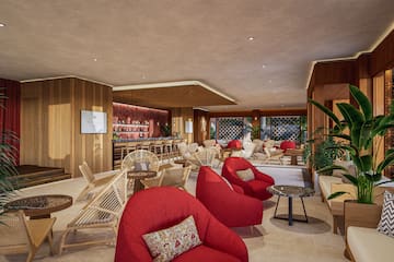 a room with chairs and tables