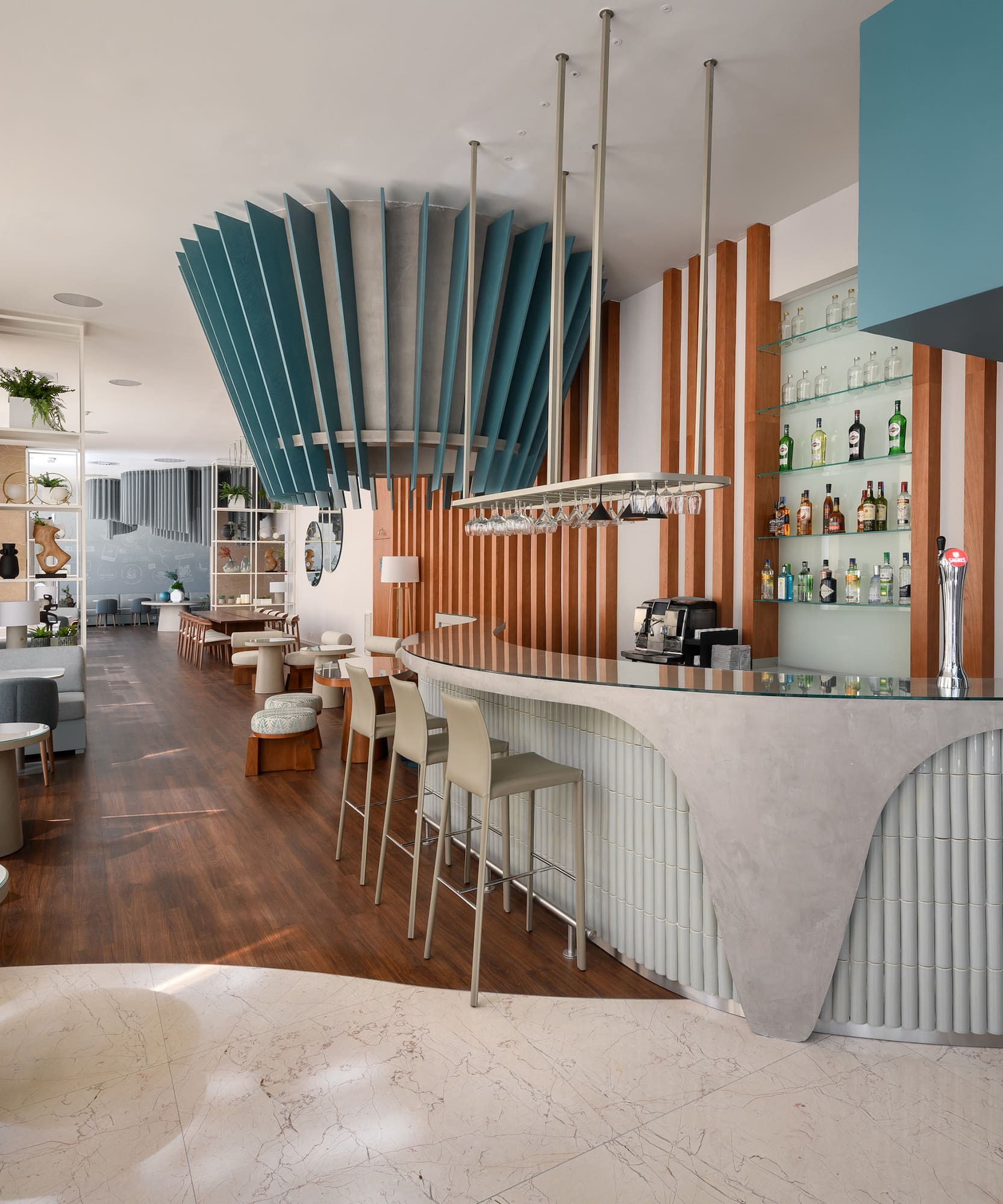 a bar with a counter and chairs