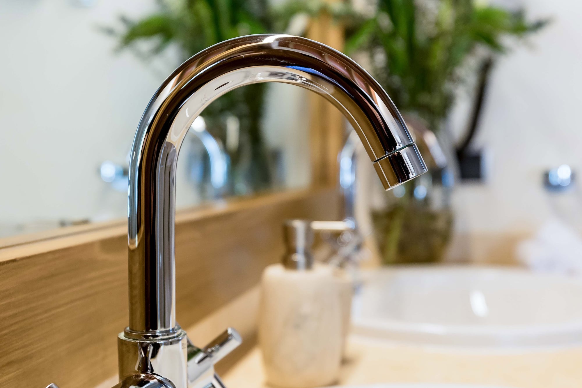 a faucet and sink in a bathroom