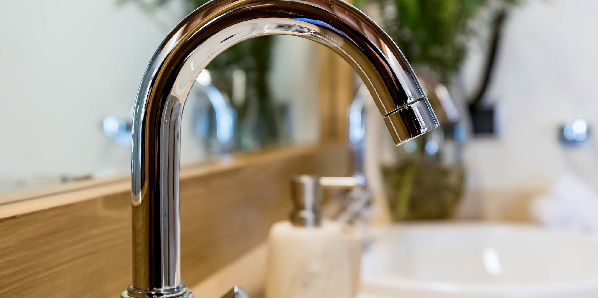 a faucet and sink in a bathroom