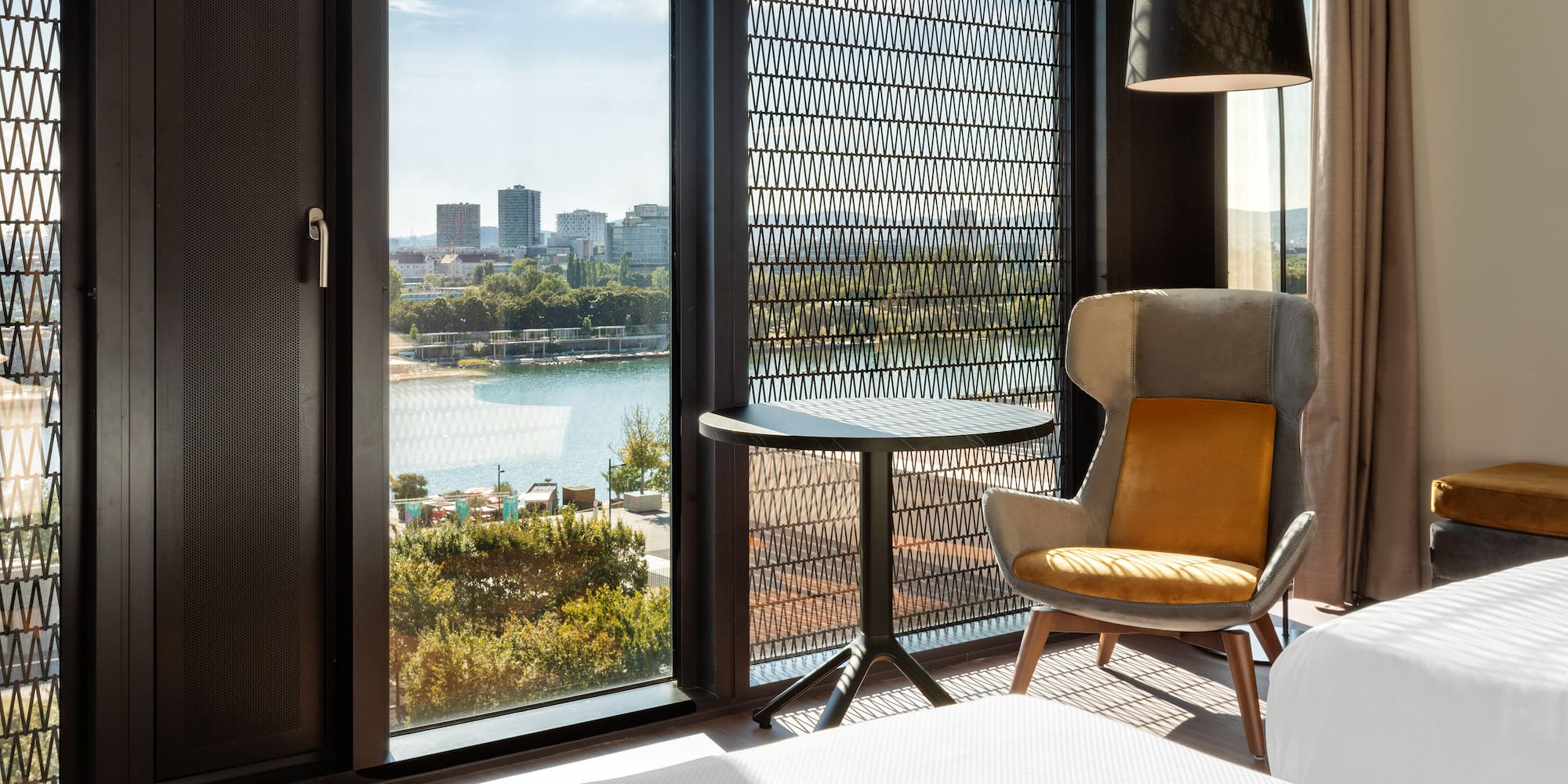 a room with a bed and a chair