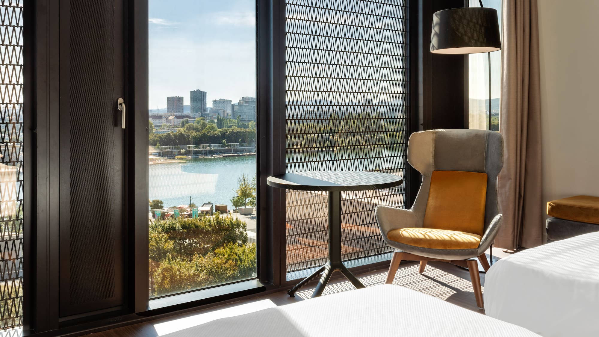 a room with a bed and a chair