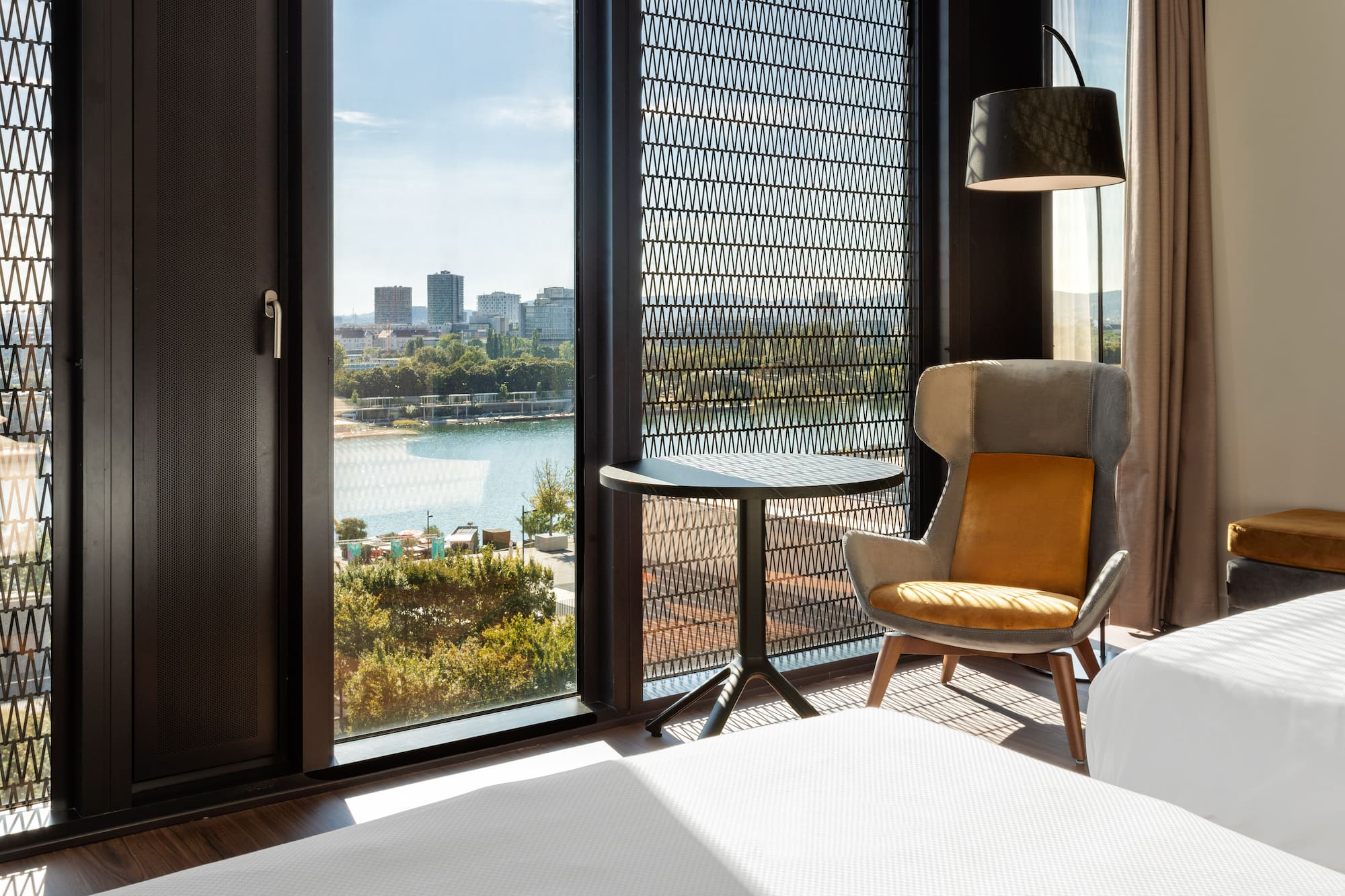 a room with a bed and a chair