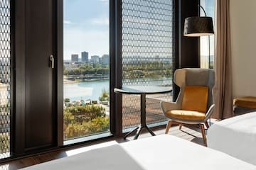 a room with a bed and a chair