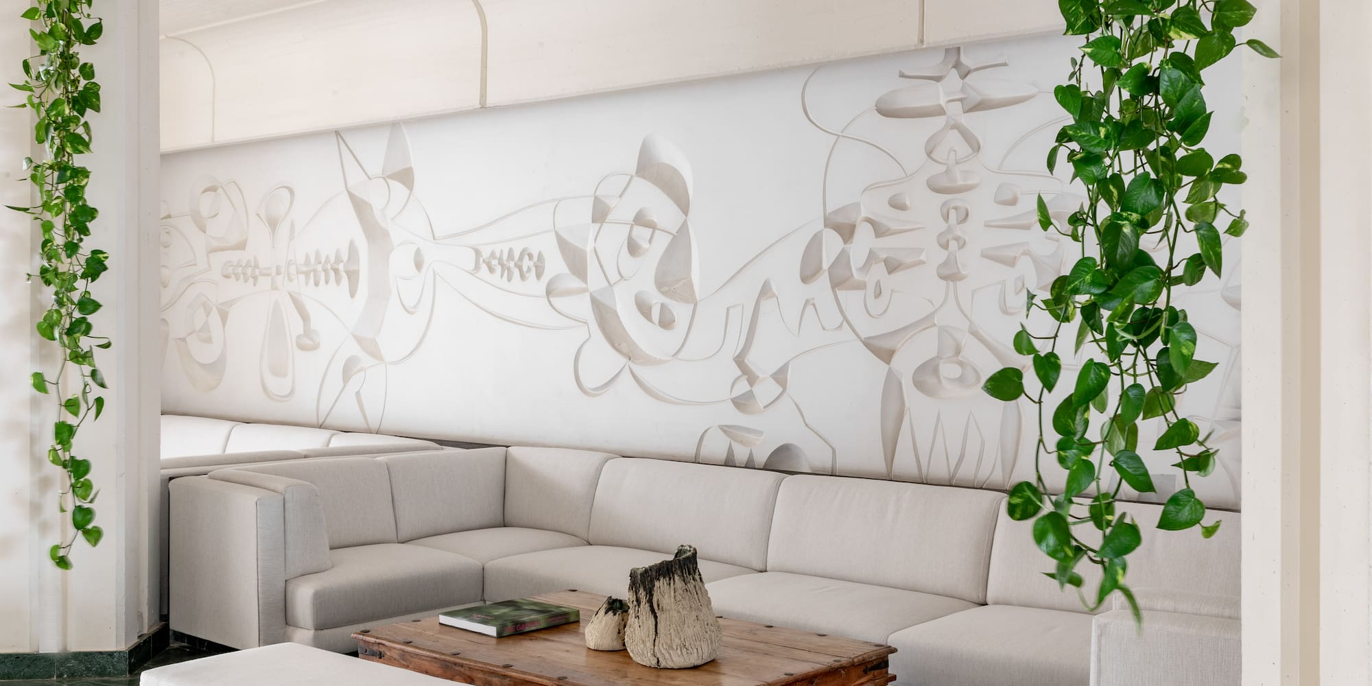 a white couch and a table in a room