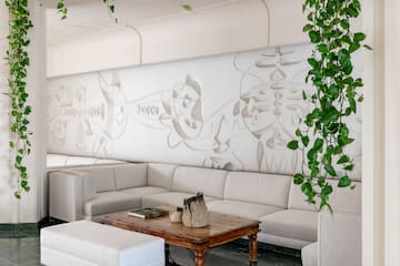 a white couch and a table in a room