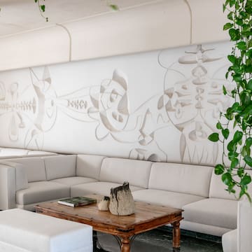 a white couch and a table in a room