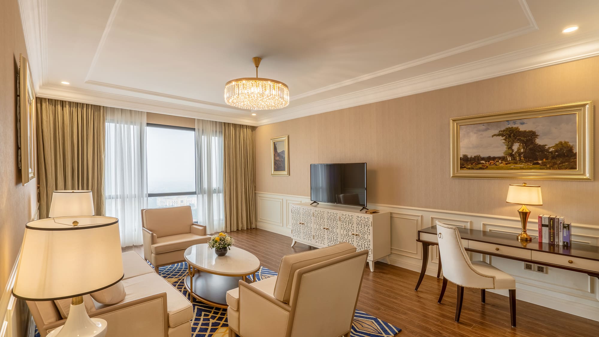 a room with a television and chairs