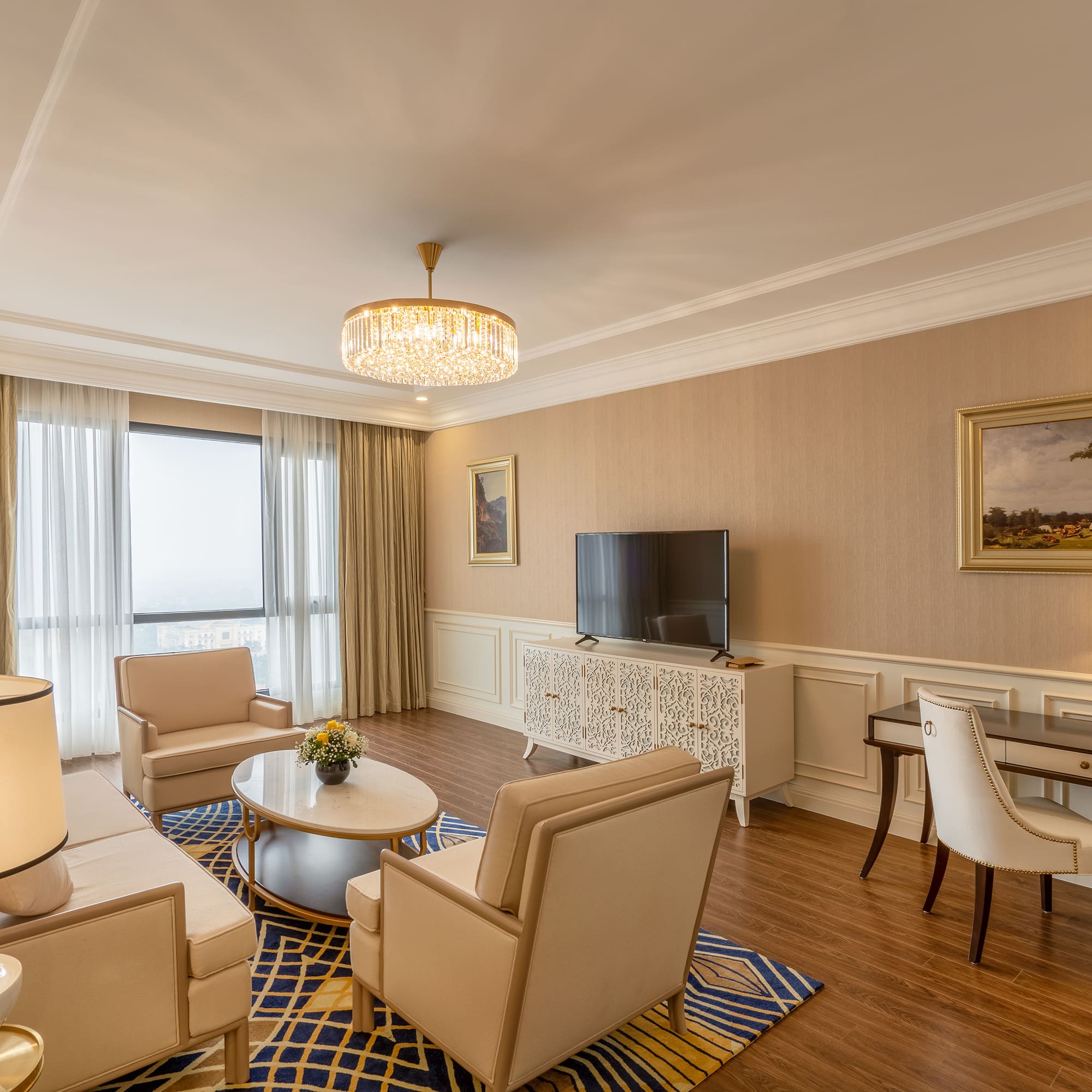 a room with a television and chairs