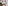 Hands playing bronze singing bowl with mallet for meditation or sound therapy.