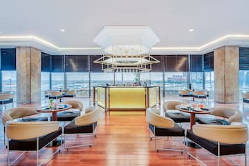 a room with tables and chairs