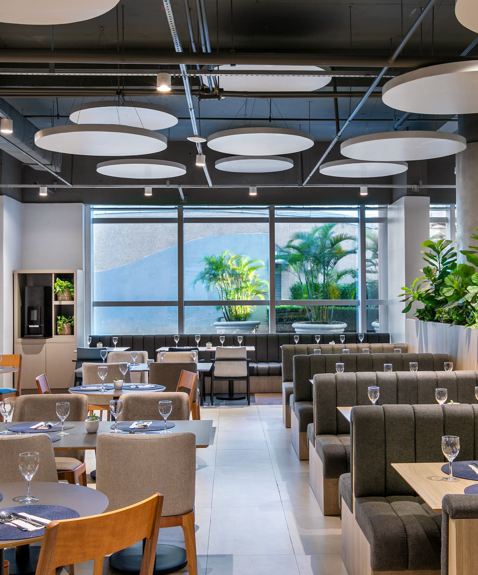 a restaurant with tables and chairs