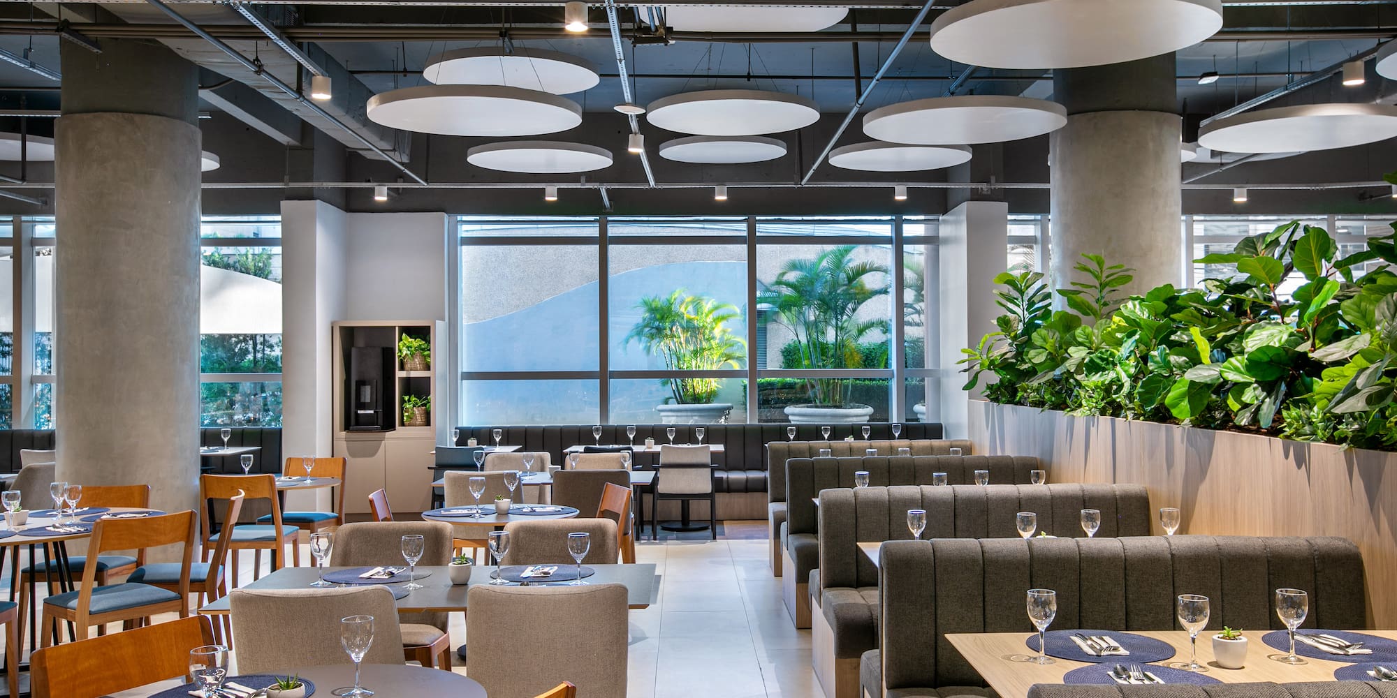 a restaurant with tables and chairs