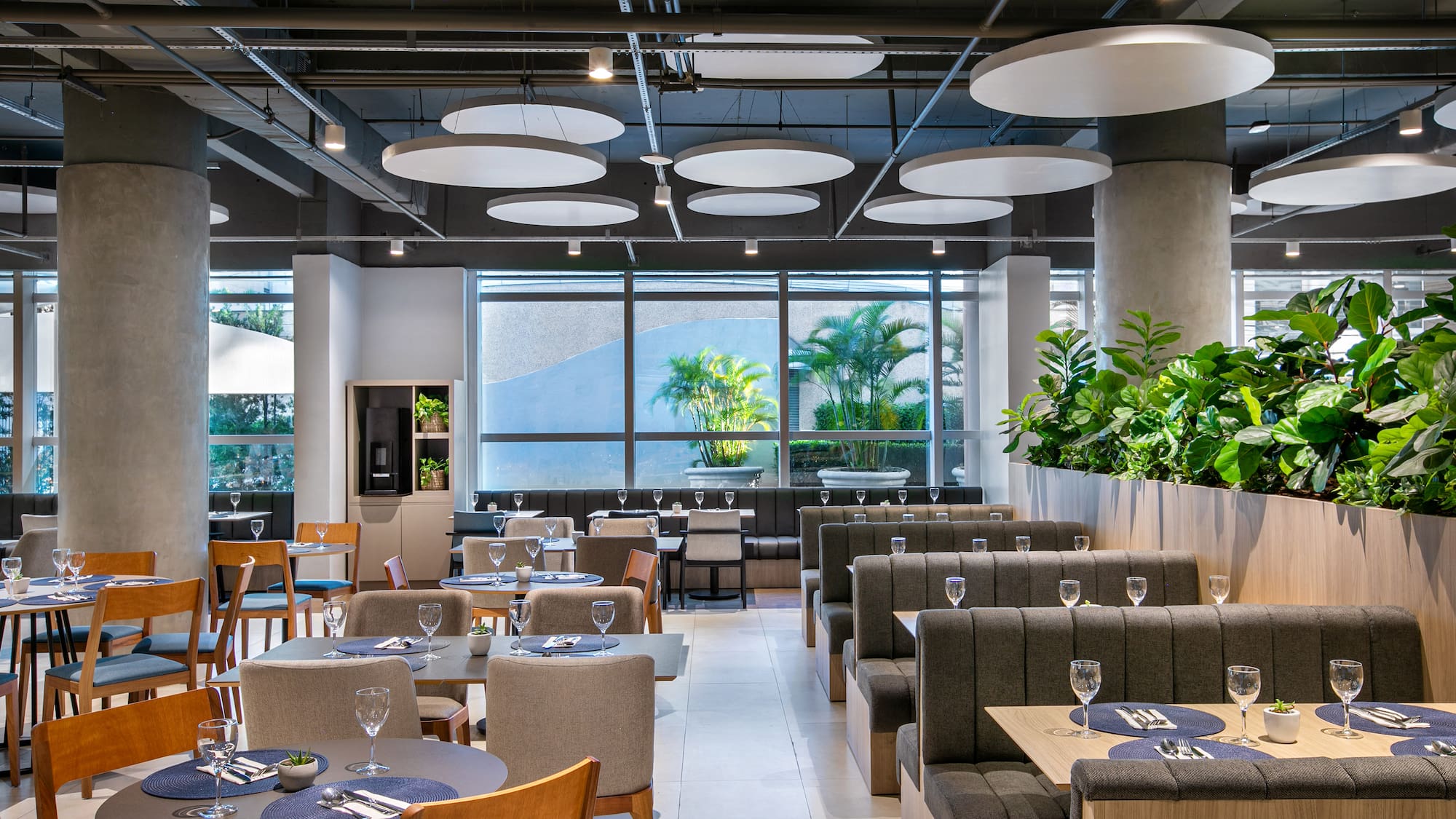 a restaurant with tables and chairs