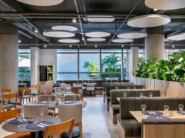 a restaurant with tables and chairs