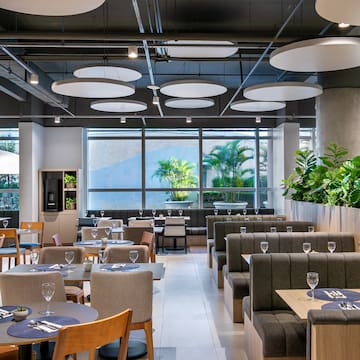 a restaurant with tables and chairs