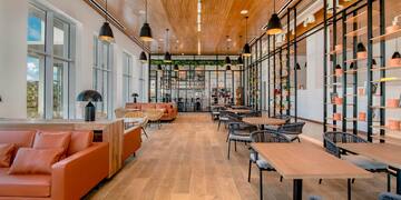 a room with tables and chairs