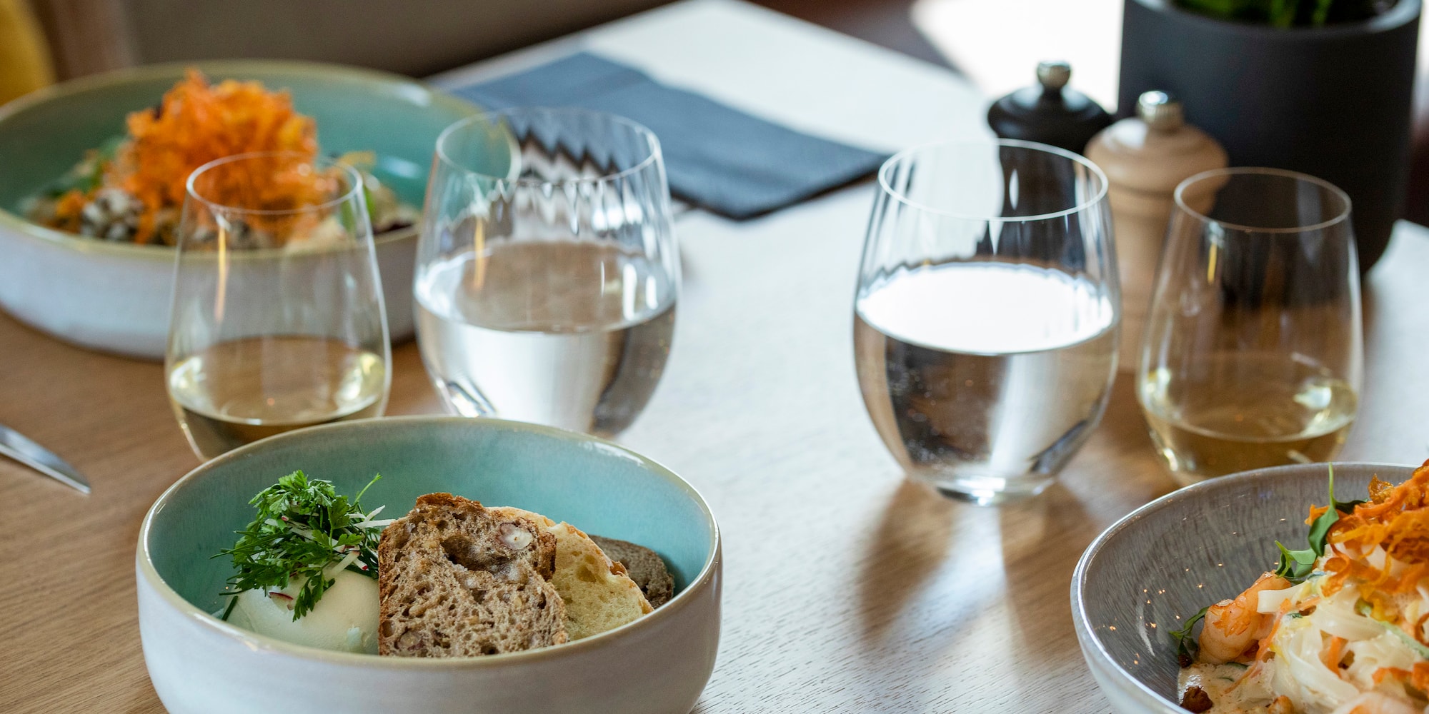 a table with food and glasses