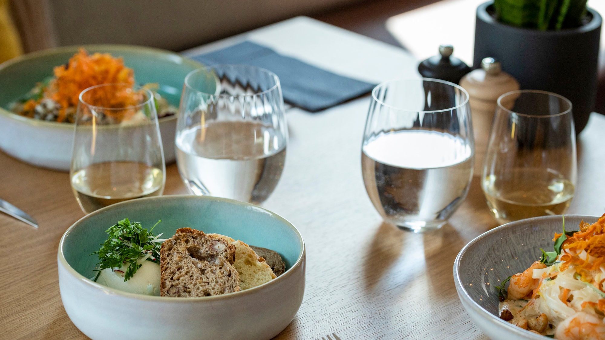 a table with food and glasses