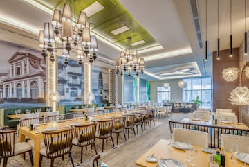 a large room with tables and chairs