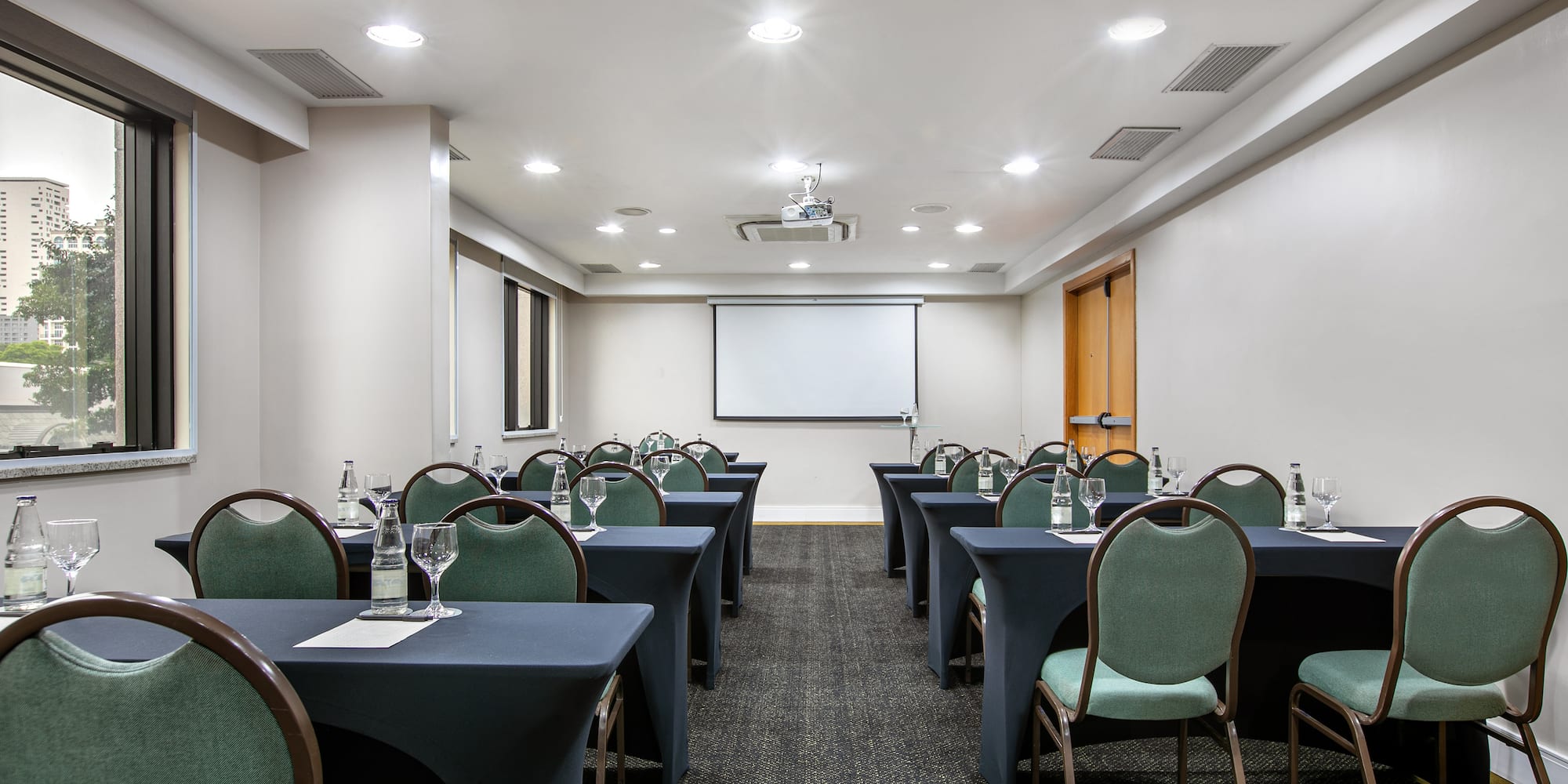 a room with tables and chairs
