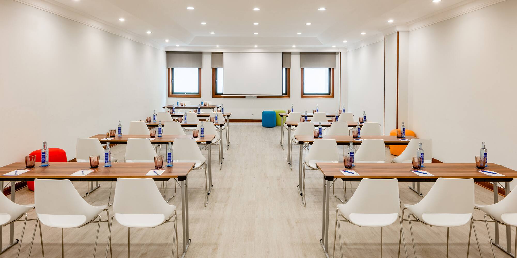 a room with tables and chairs