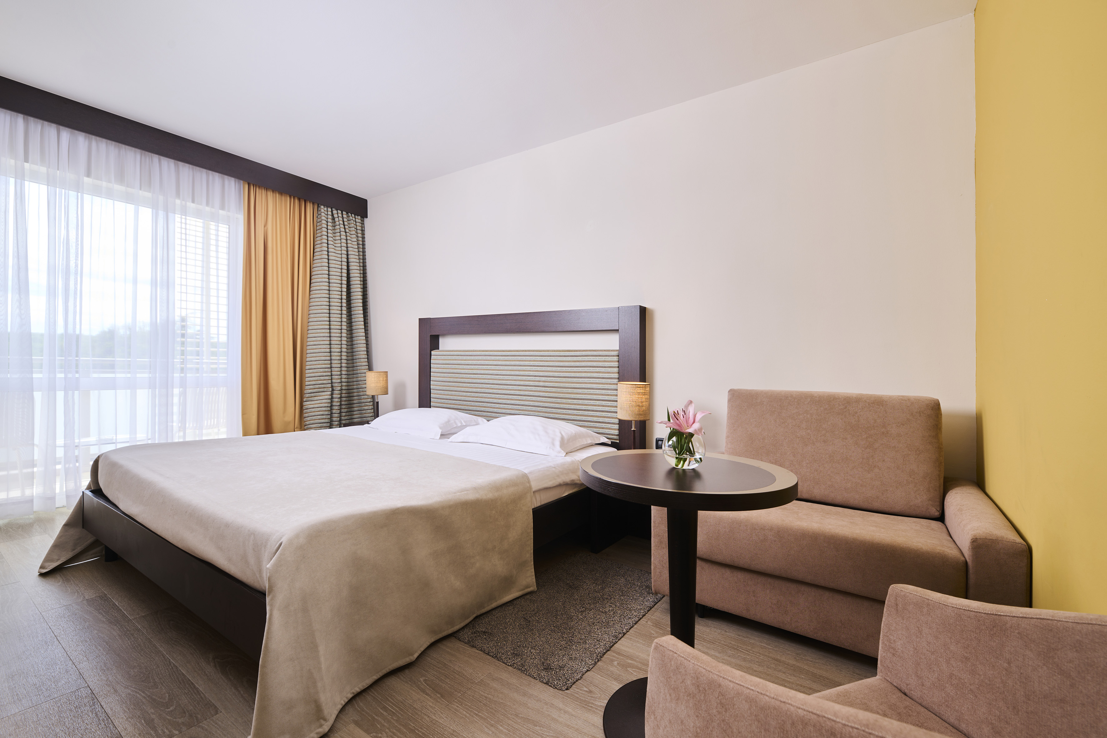 a room with a bed and a table