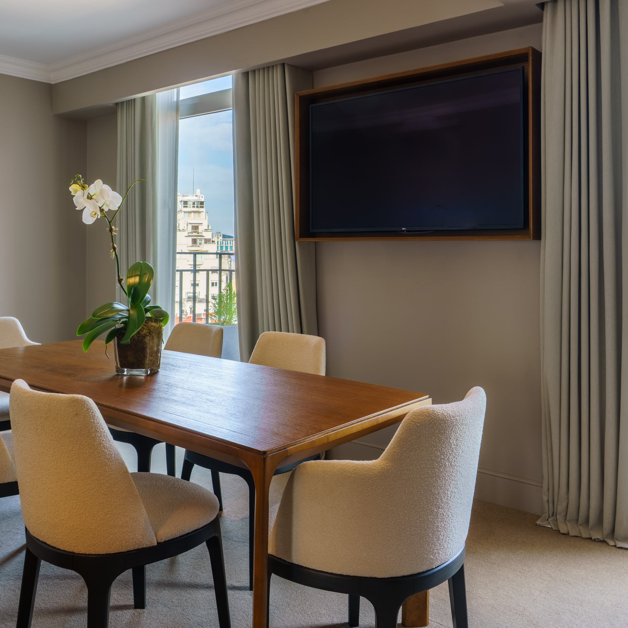 a room with a table and chairs