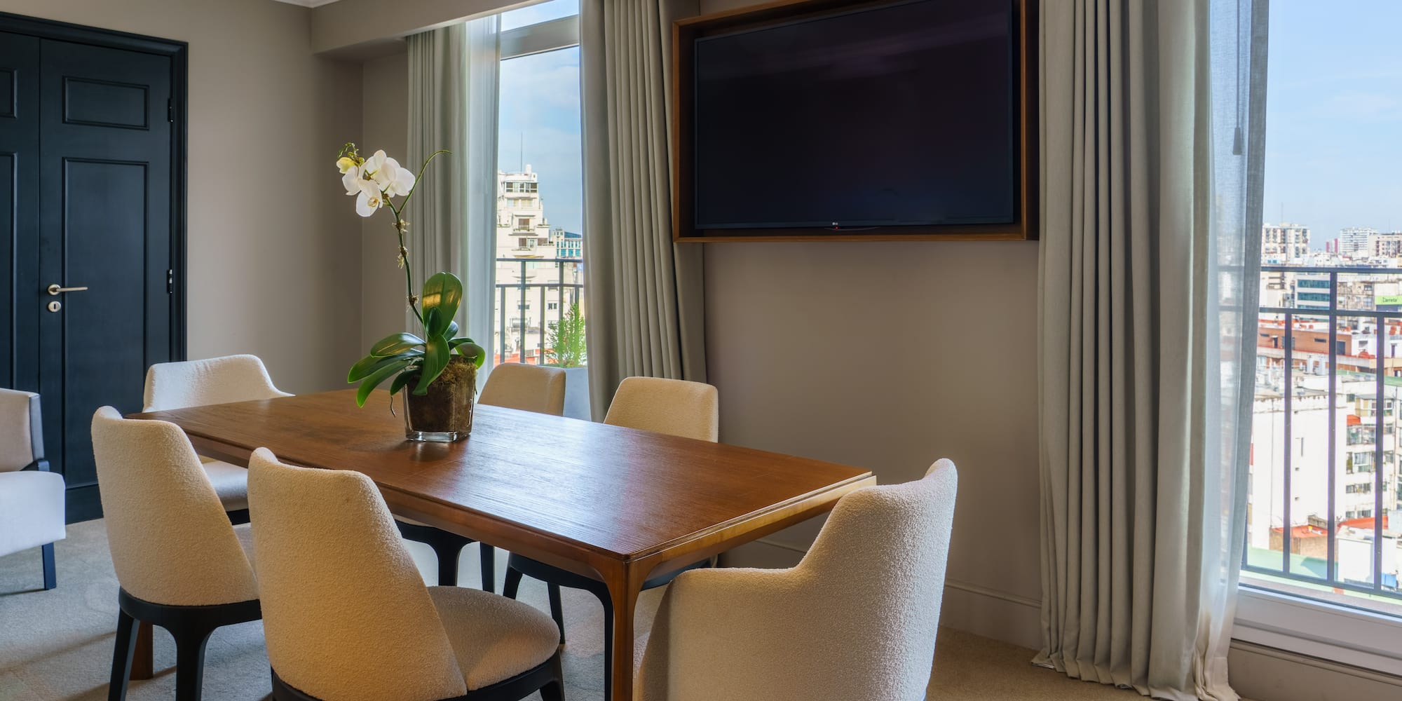 a room with a table and chairs