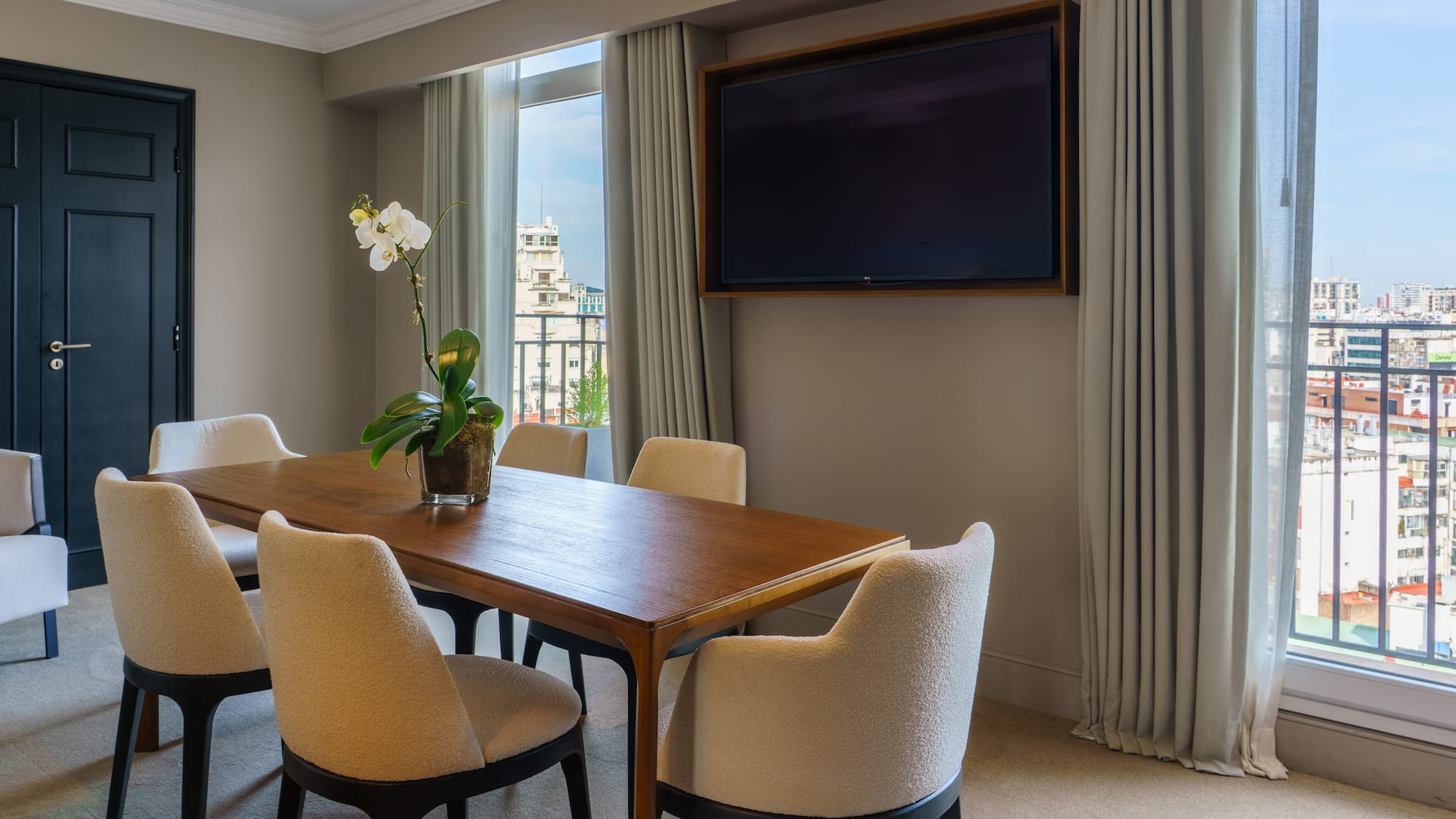 a room with a table and chairs