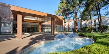 a water fountain in front of a building