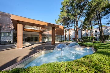 a water fountain in front of a building