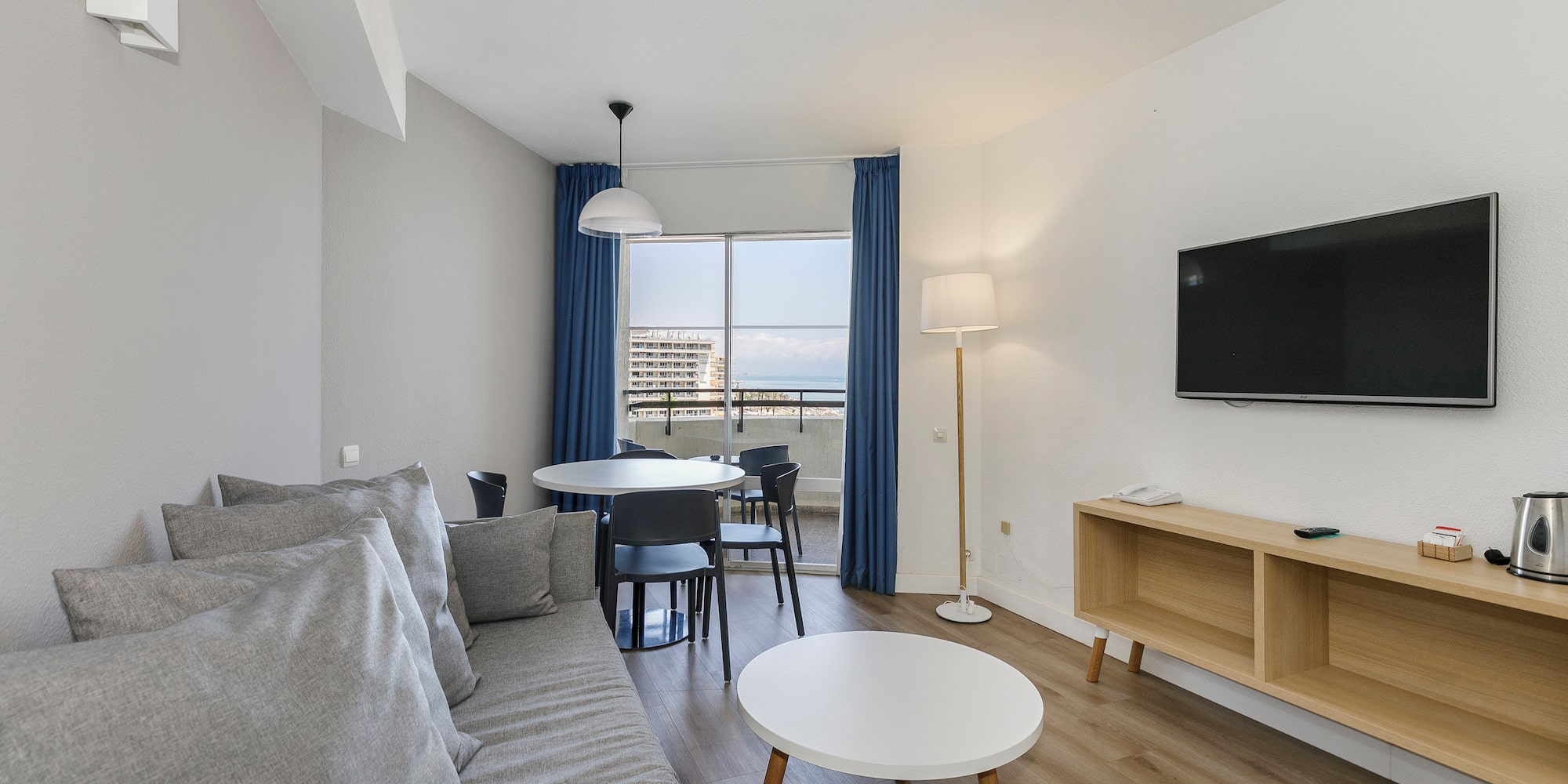 a living room with a couch and table