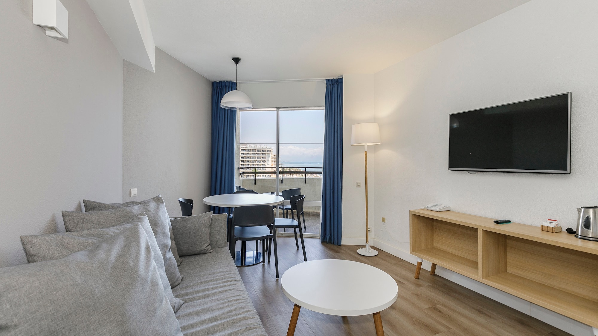 a living room with a couch and table