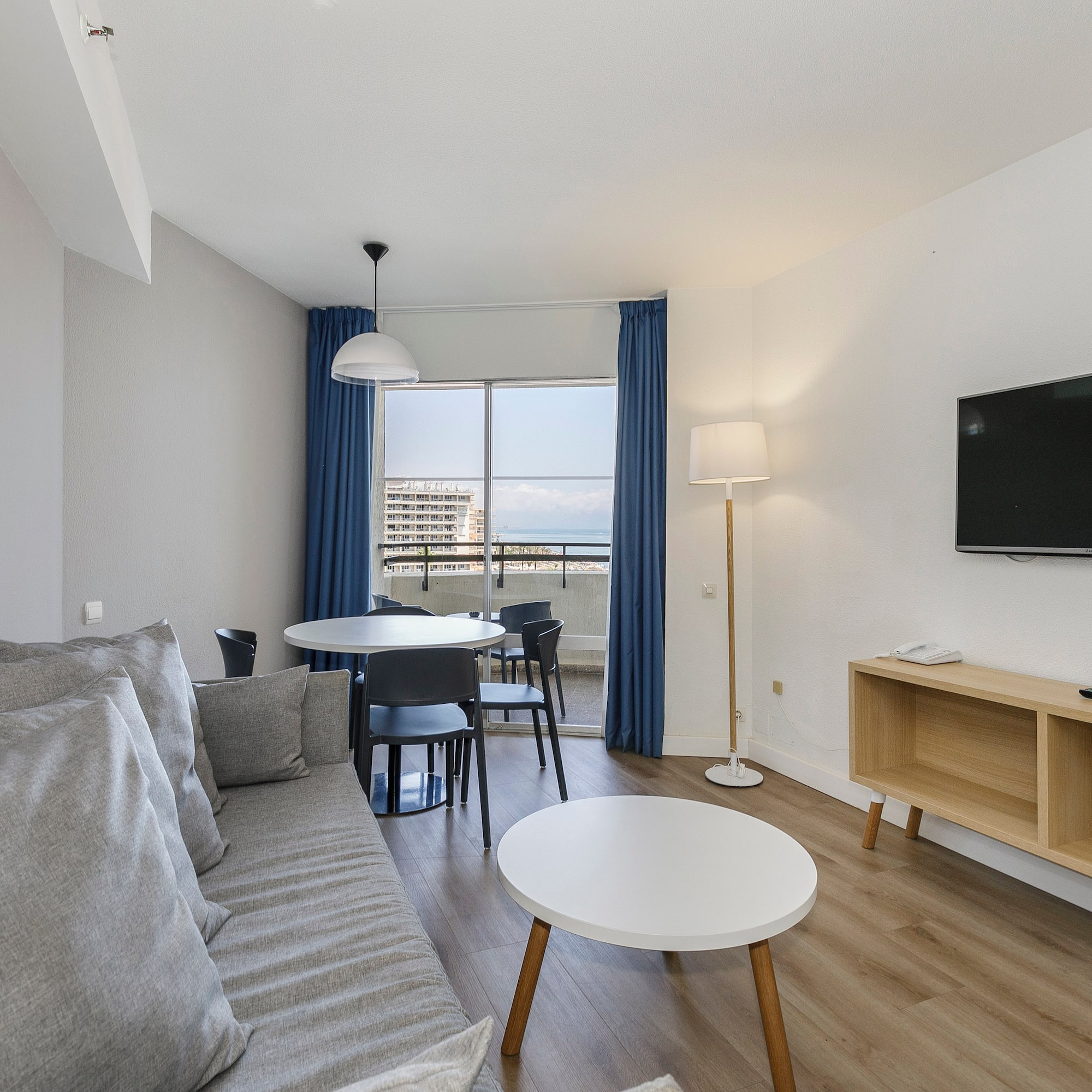 a living room with a couch and table