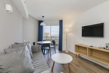 a living room with a couch and table