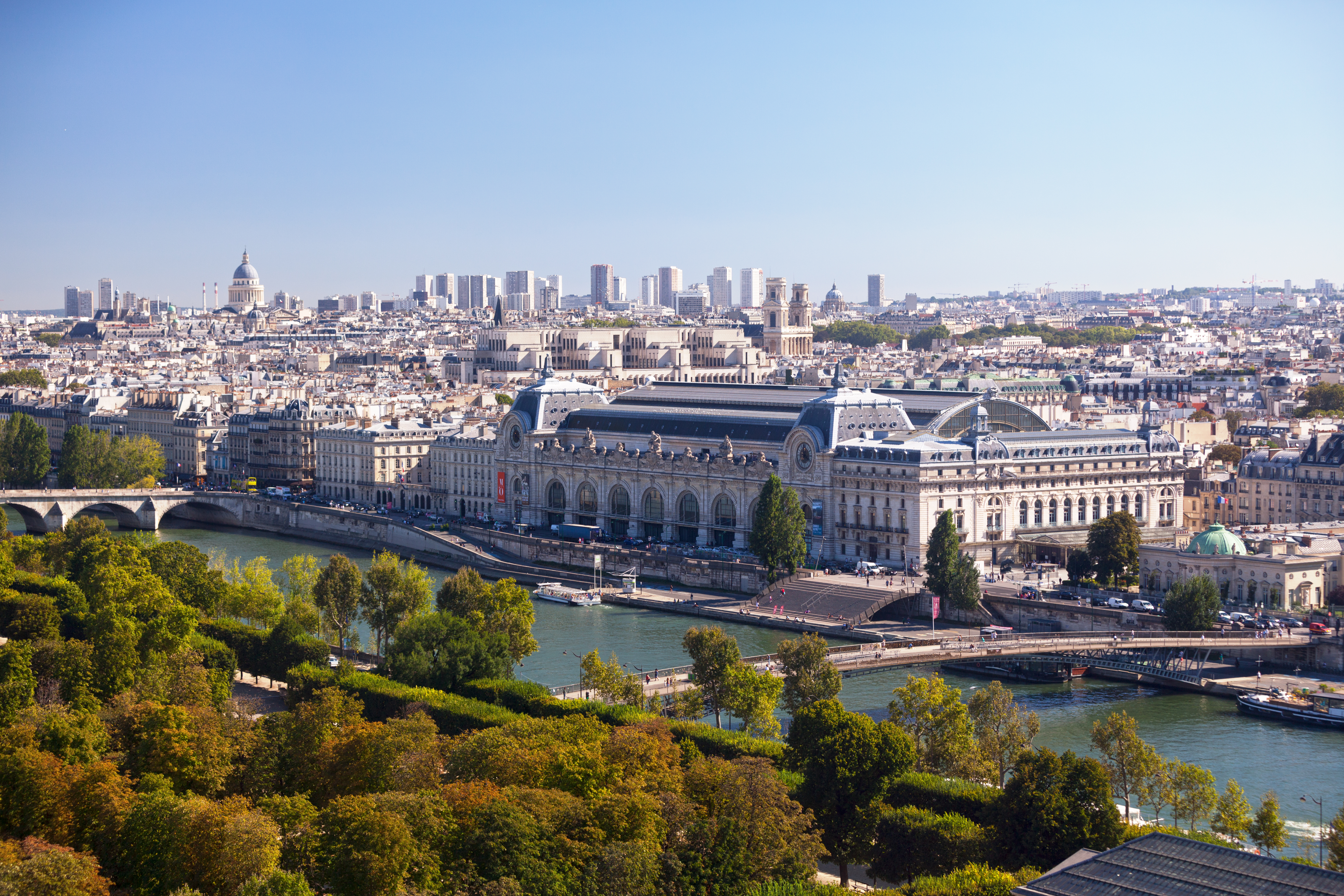 a large building next to a river