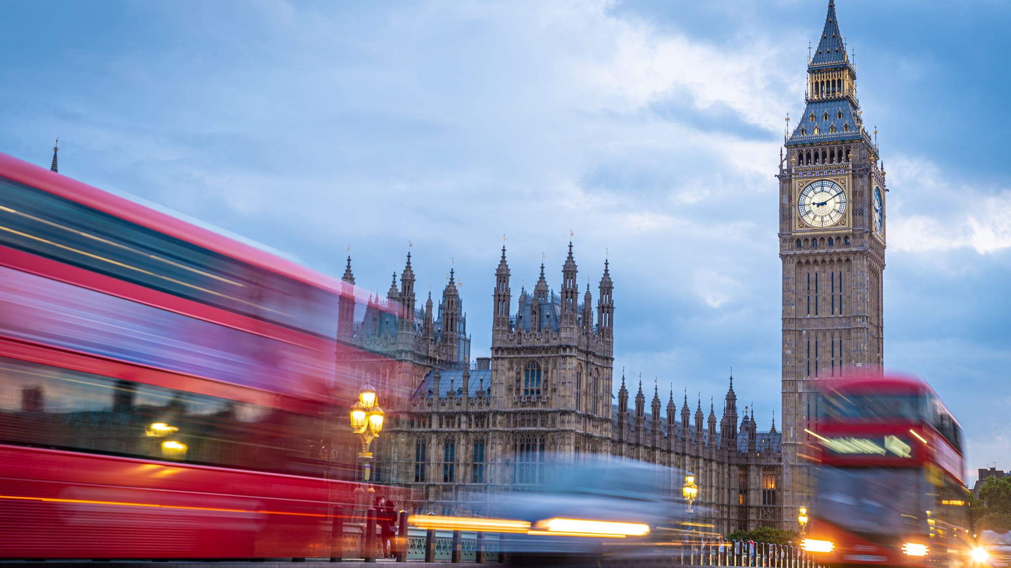 a clock tower in the distance featuring Big Ben