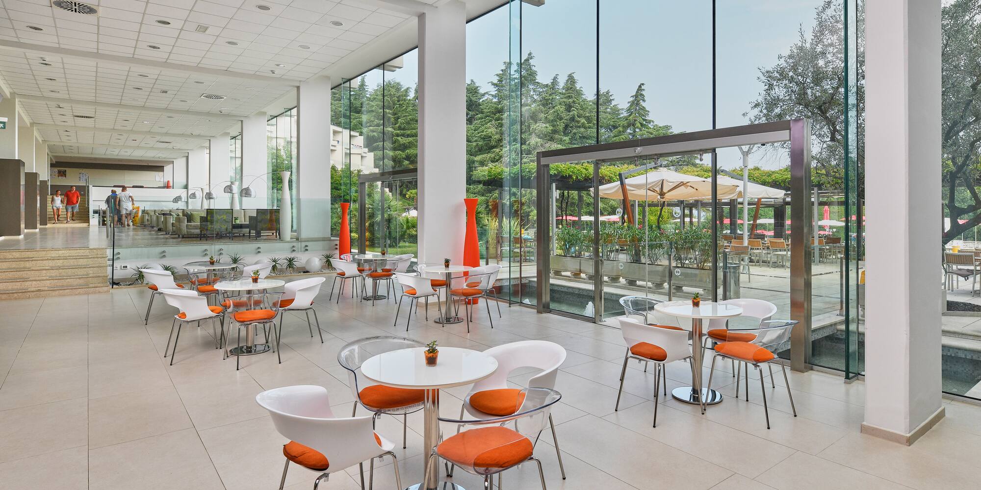 a room with tables and chairs