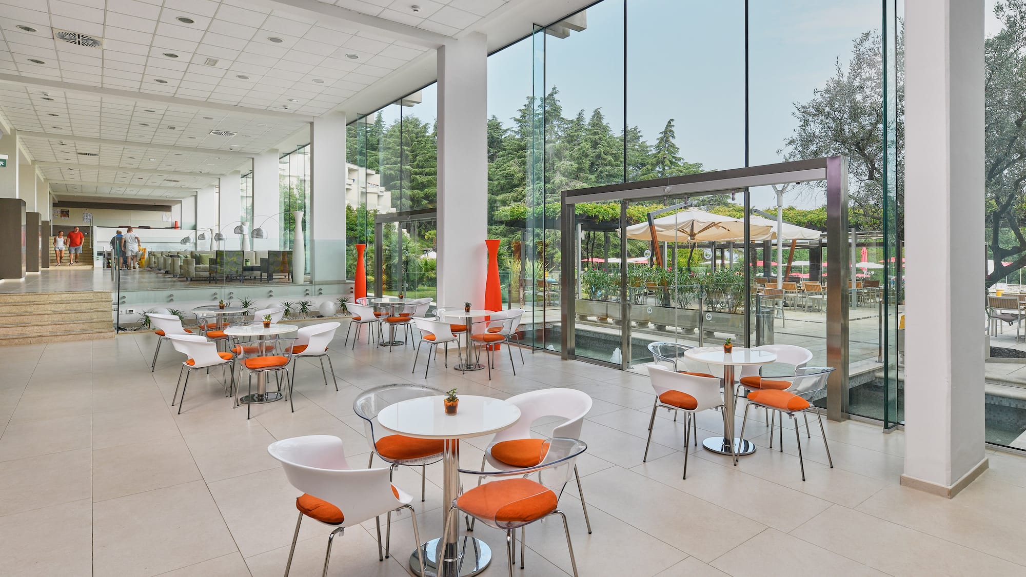 a room with tables and chairs