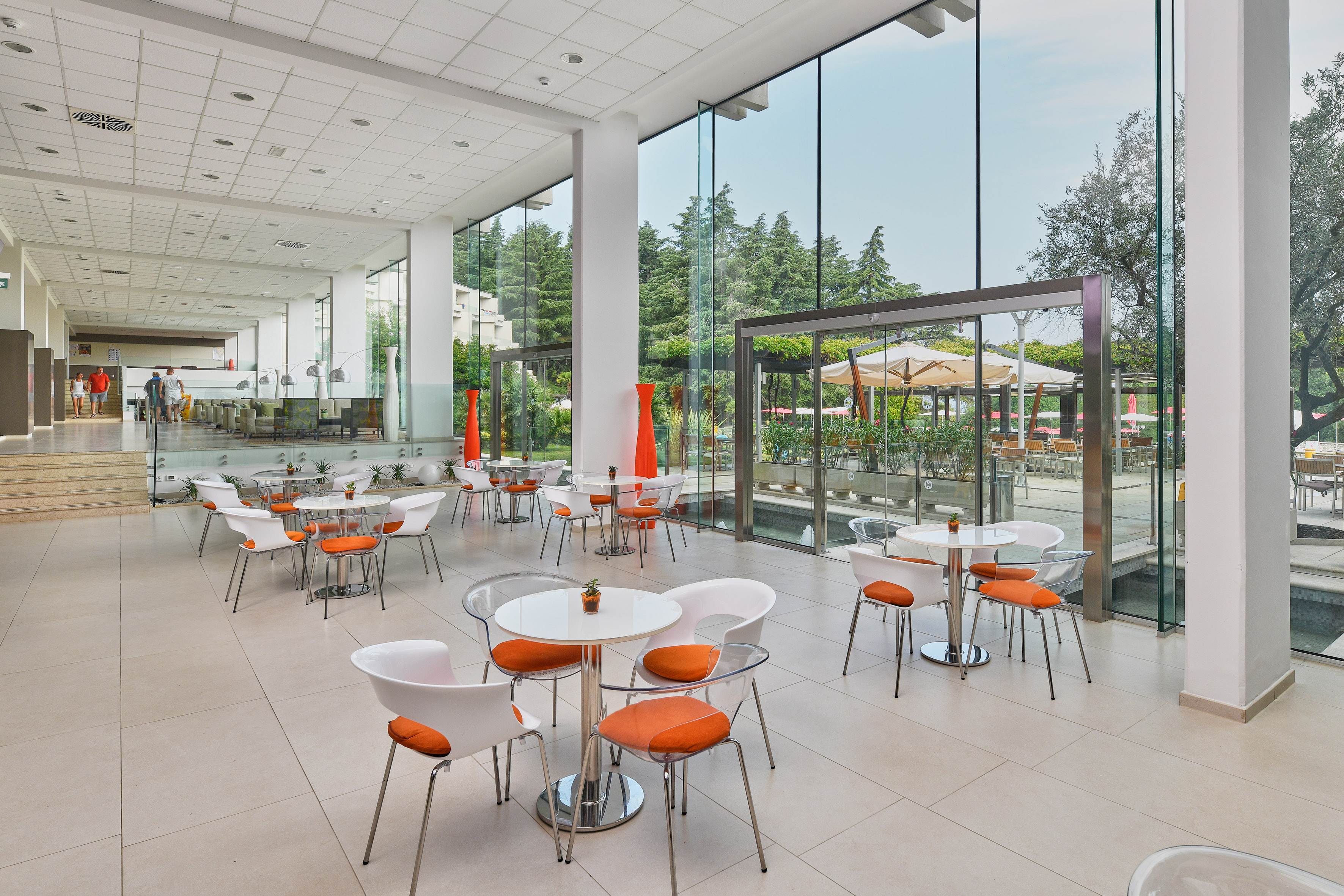 a room with tables and chairs