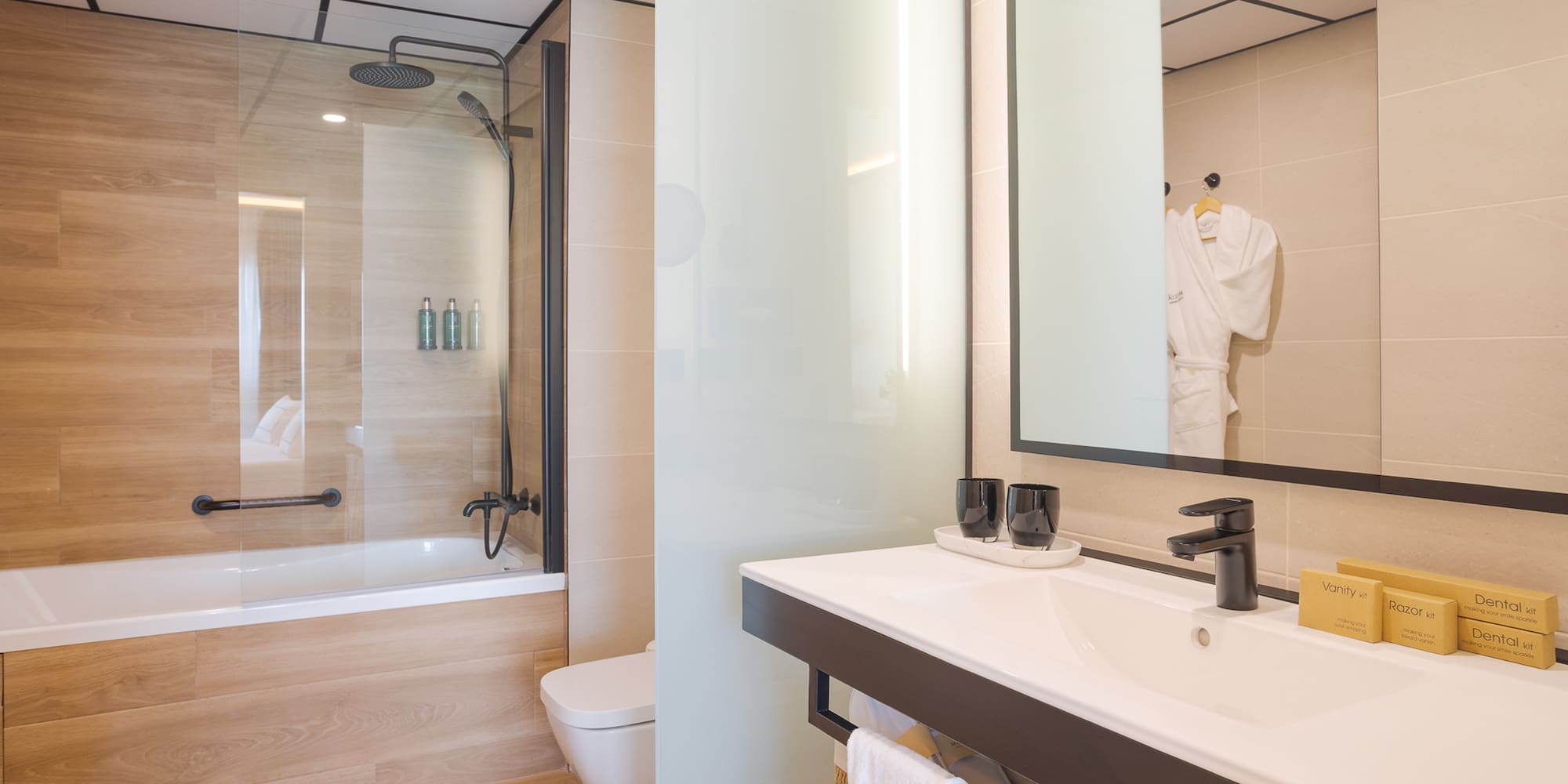 a bathroom with a shower and a bathtub