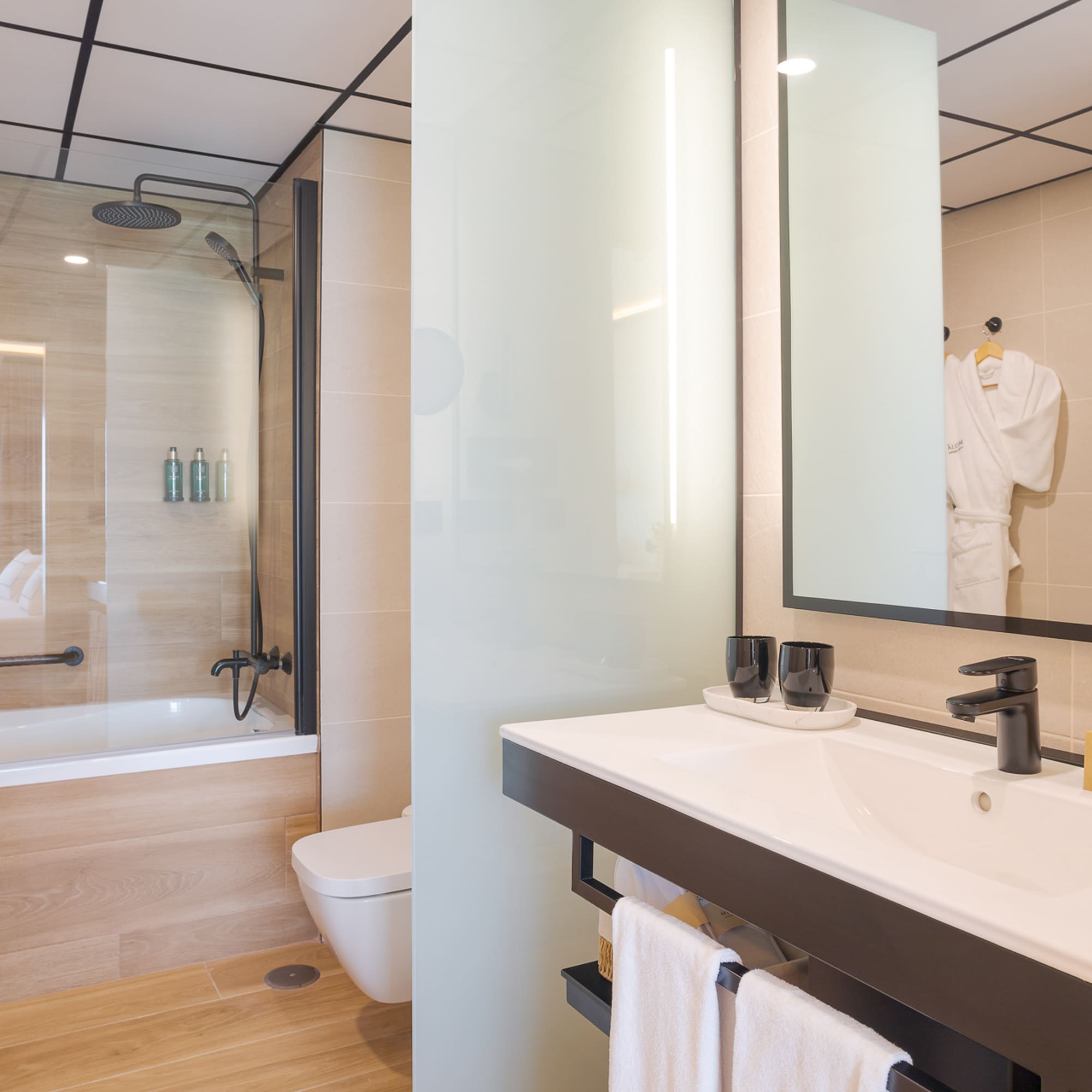 a bathroom with a shower and a bathtub